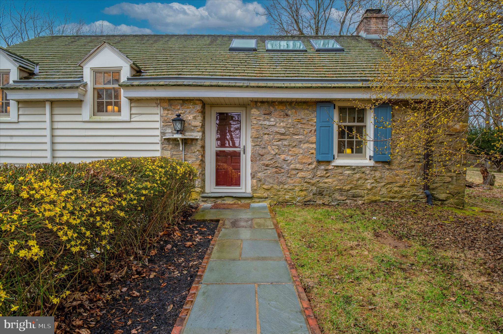 565 Upper Pike Creek Road Newark, DE 19711 - Photo 2 of 23 Charming stone cottage with vibrant landscaping.