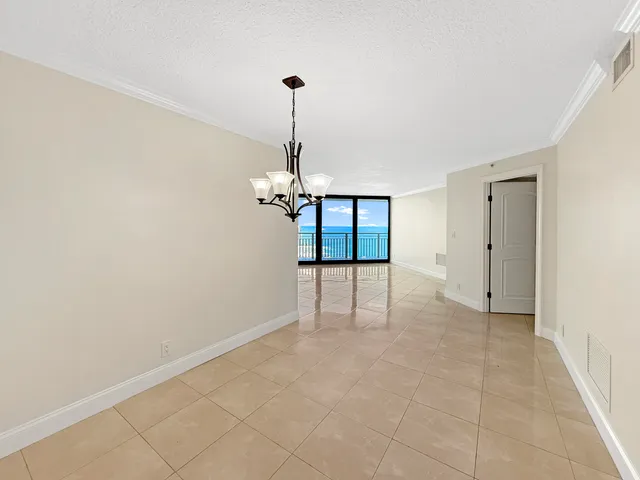 a bedroom with bed and a couch