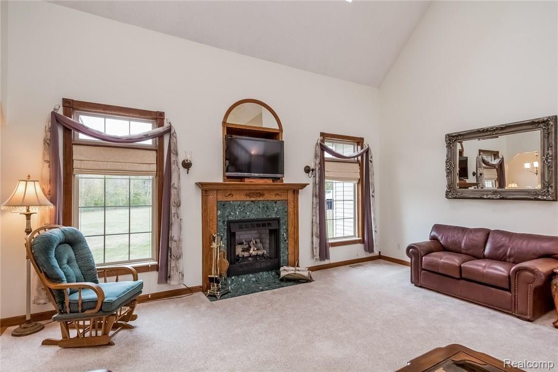 23835 Elwell Road Belleville, MI 48111 - Photo 8 of 78 GREAT ROOM MARBLE SURROUND GAS FIREPLACE