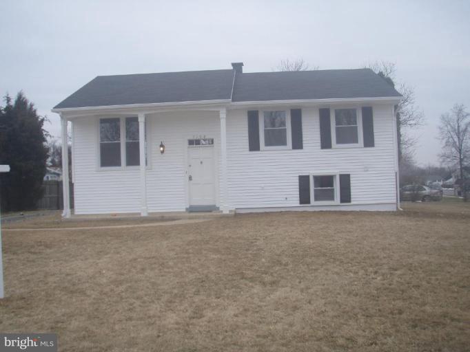 7108 Reno Road Windsor Mill, MD 21244 - Photo 1 of 29 a front view of house with yard