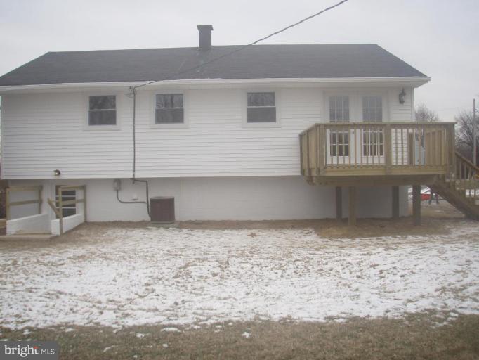 7108 Reno Road Windsor Mill, MD 21244 - Photo 23 of 29 a front view of a house with yard