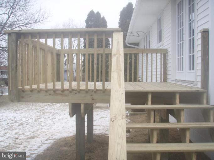 7108 Reno Road Windsor Mill, MD 21244 - Photo 26 of 29 a front view of a house with glass windows