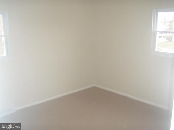 7108 Reno Road Windsor Mill, MD 21244 - Photo 9 of 29 a small space with a window