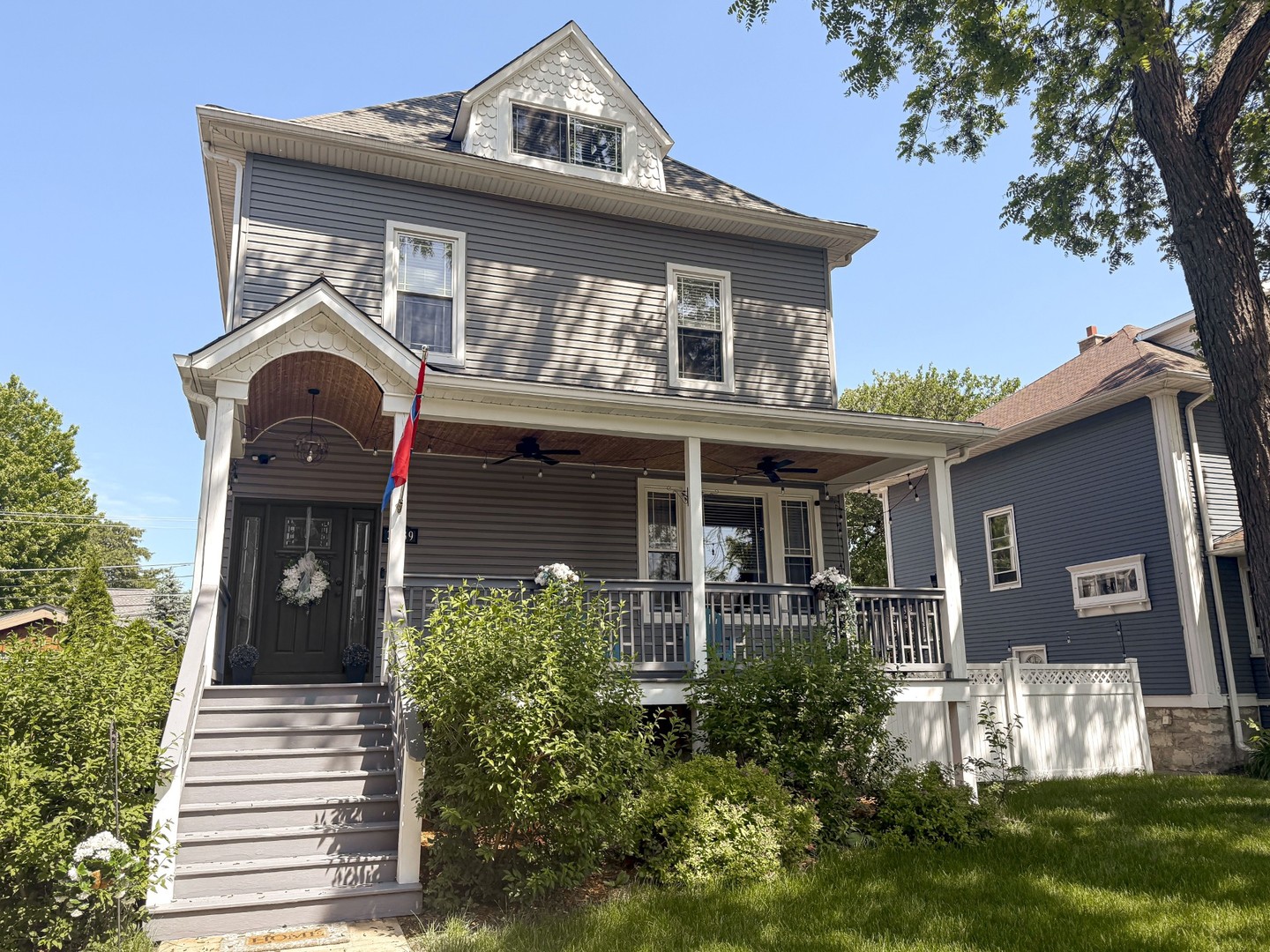 front view of a house with a small yard