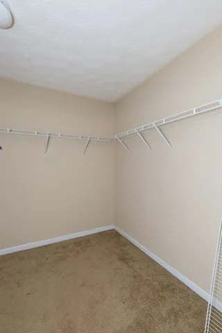 a view of a room with racks on the wall