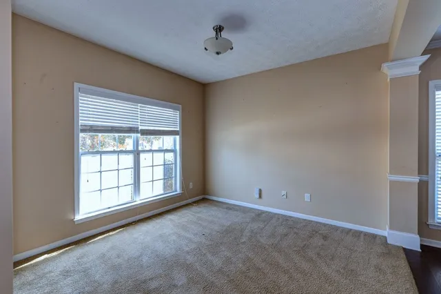 an empty room with windows