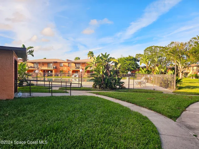 a view of a street with a houses