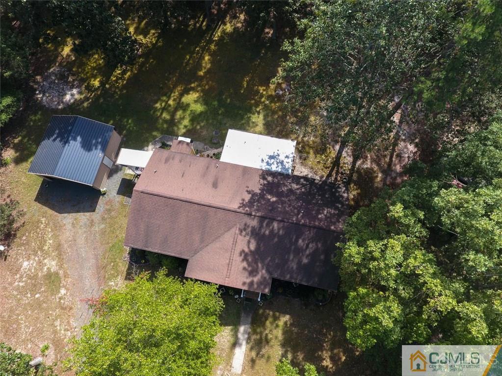 501 Pinehurst Road Cream Ridge, NJ 08514 - Photo 34 of 36 an aerial view of a house with a yard