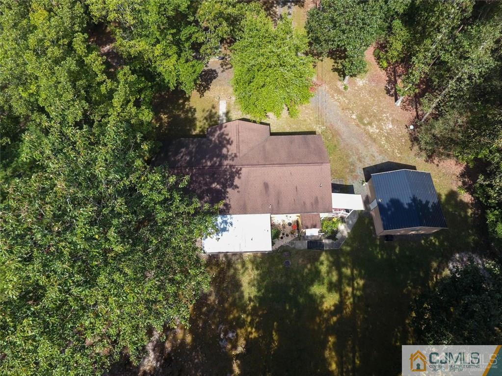 501 Pinehurst Road Cream Ridge, NJ 08514 - Photo 35 of 36 an aerial view of residential house with outdoor space and trees all around