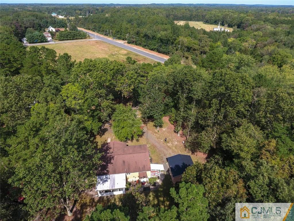 501 Pinehurst Road Cream Ridge, NJ 08514 - Photo 36 of 36 an aerial view of a house with a yard