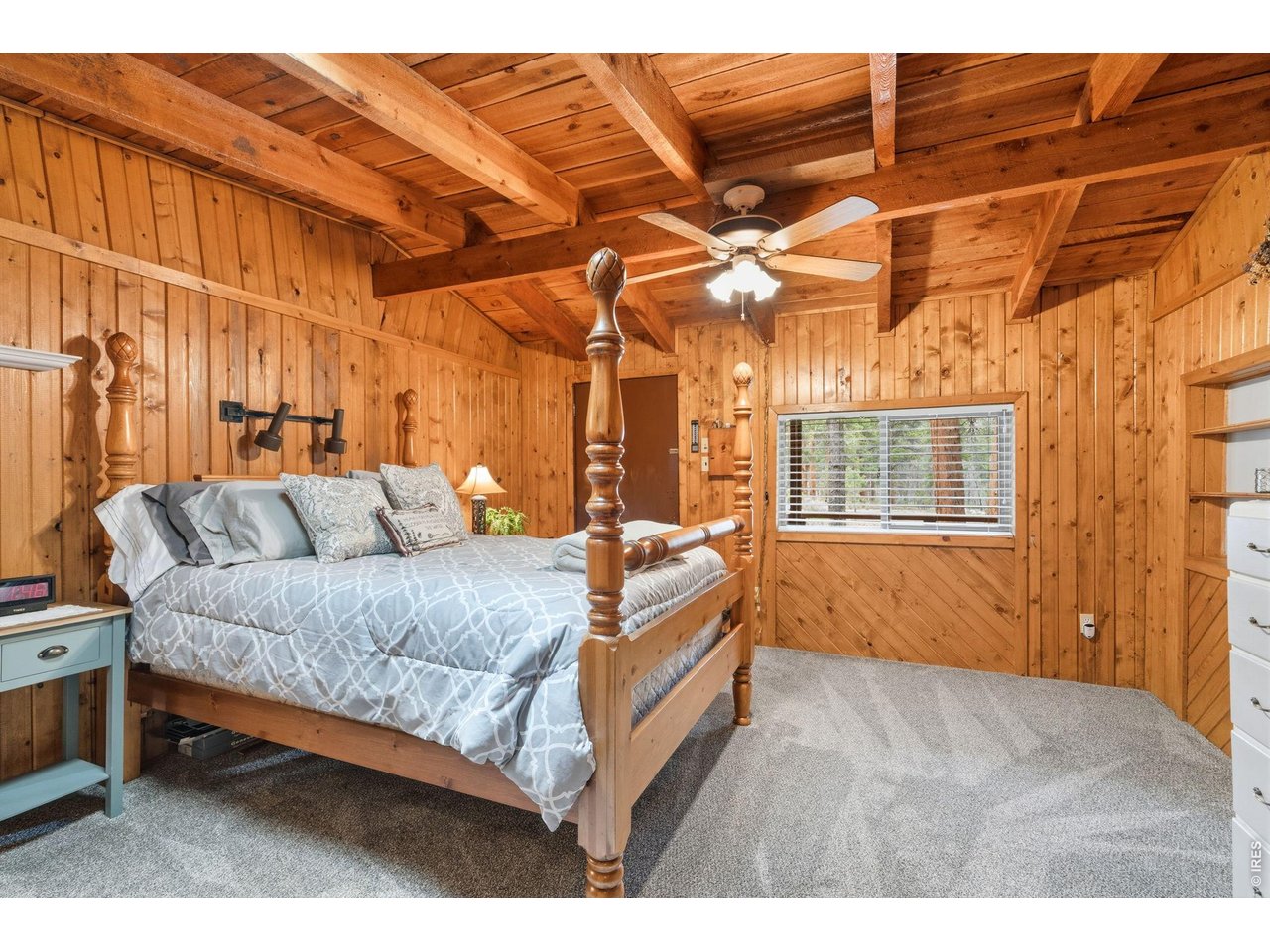 36917 Poudre Canyon Road Bellvue, CO 80512 - Photo 21 of 46 Primary bedroom with newer carpet