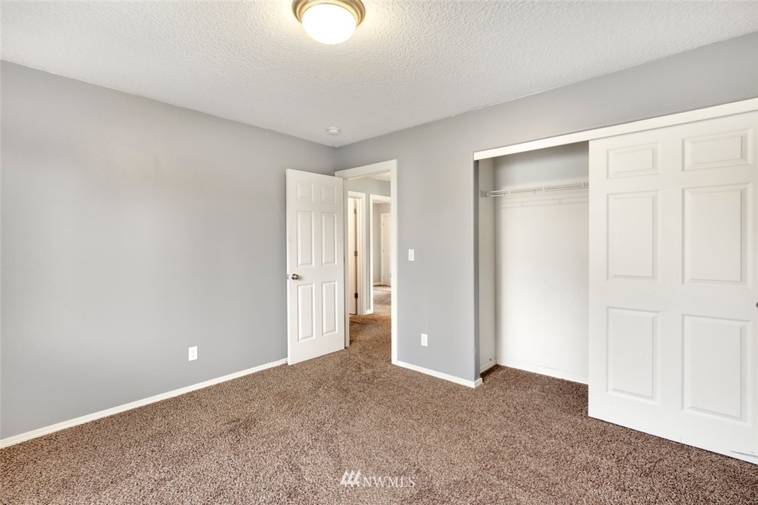 16410 Northeast 12th Court Ridgefield, WA 98642 - Photo 18 of 25 a view of an empty room and closet area