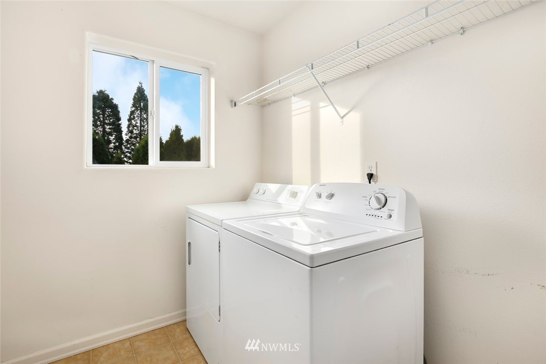 16410 Northeast 12th Court Ridgefield, WA 98642 - Photo 21 of 25 a bathroom with a sink and a mirror