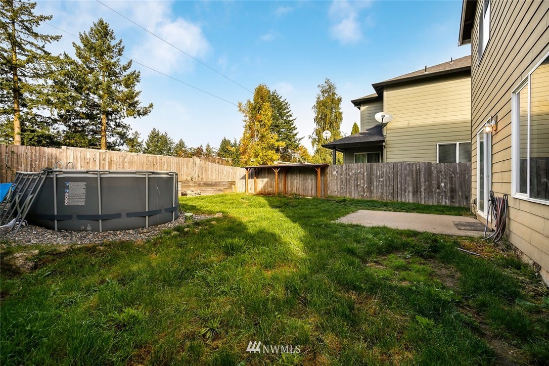 16410 Northeast 12th Court Ridgefield, WA 98642 - Photo 23 of 25 a view of a back yard of the house