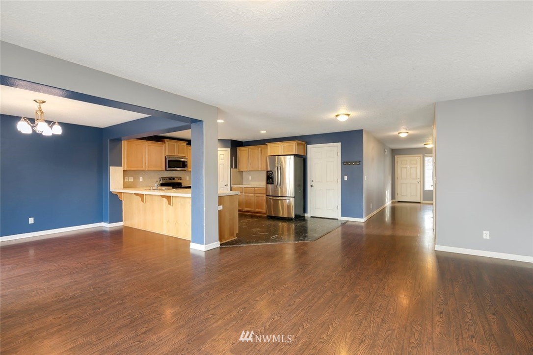 16410 Northeast 12th Court Ridgefield, WA 98642 - Photo 6 of 25 a view of a kitchen with a sink and a large window
