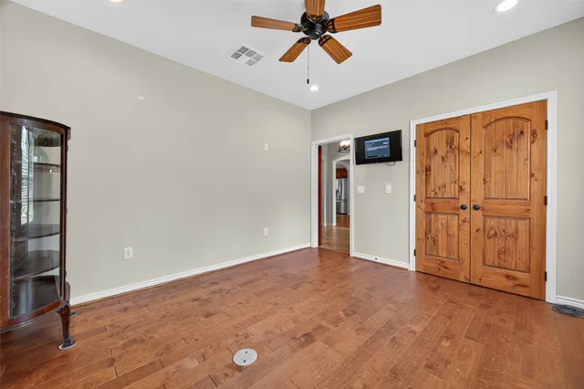 a living room with furniture fireplace and flat screen tv