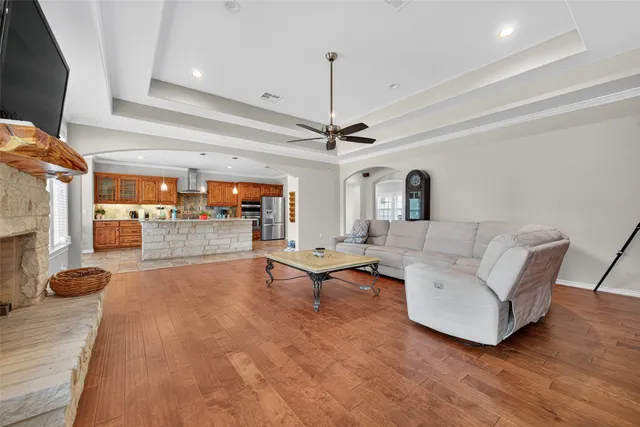a view of a dining room with furniture and a window