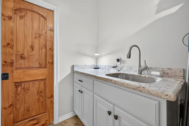 a room with furniture and a flat screen tv