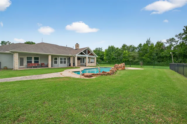 a garden view with a fountain
