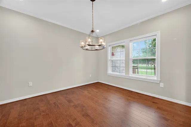 a view of a livingroom with a furniture chandelier