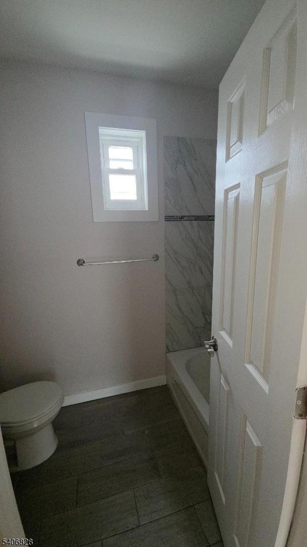 10 Shaw Avenue, Unit 2 Newark, NJ 07112 - Photo 12 of 15 a bathroom with a toilet