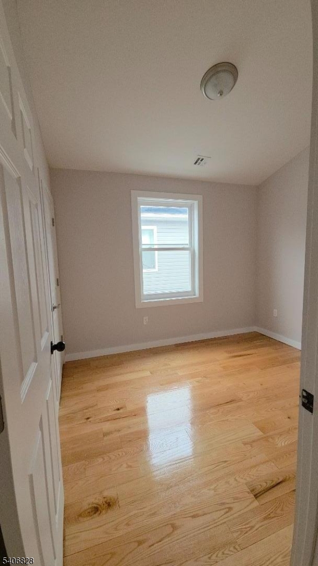 10 Shaw Avenue, Unit 2 Newark, NJ 07112 - Photo 7 of 15 a view of an empty room with a window