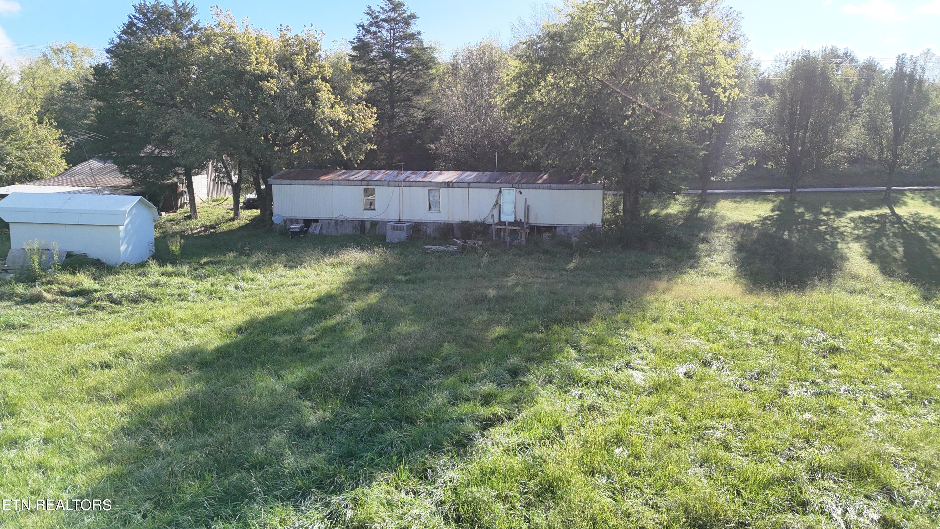 1039 Millican Grove Road Sevierville, TN 37876 - Photo 8 of 27 dji_fly_20260925_094640_0859_17903758658