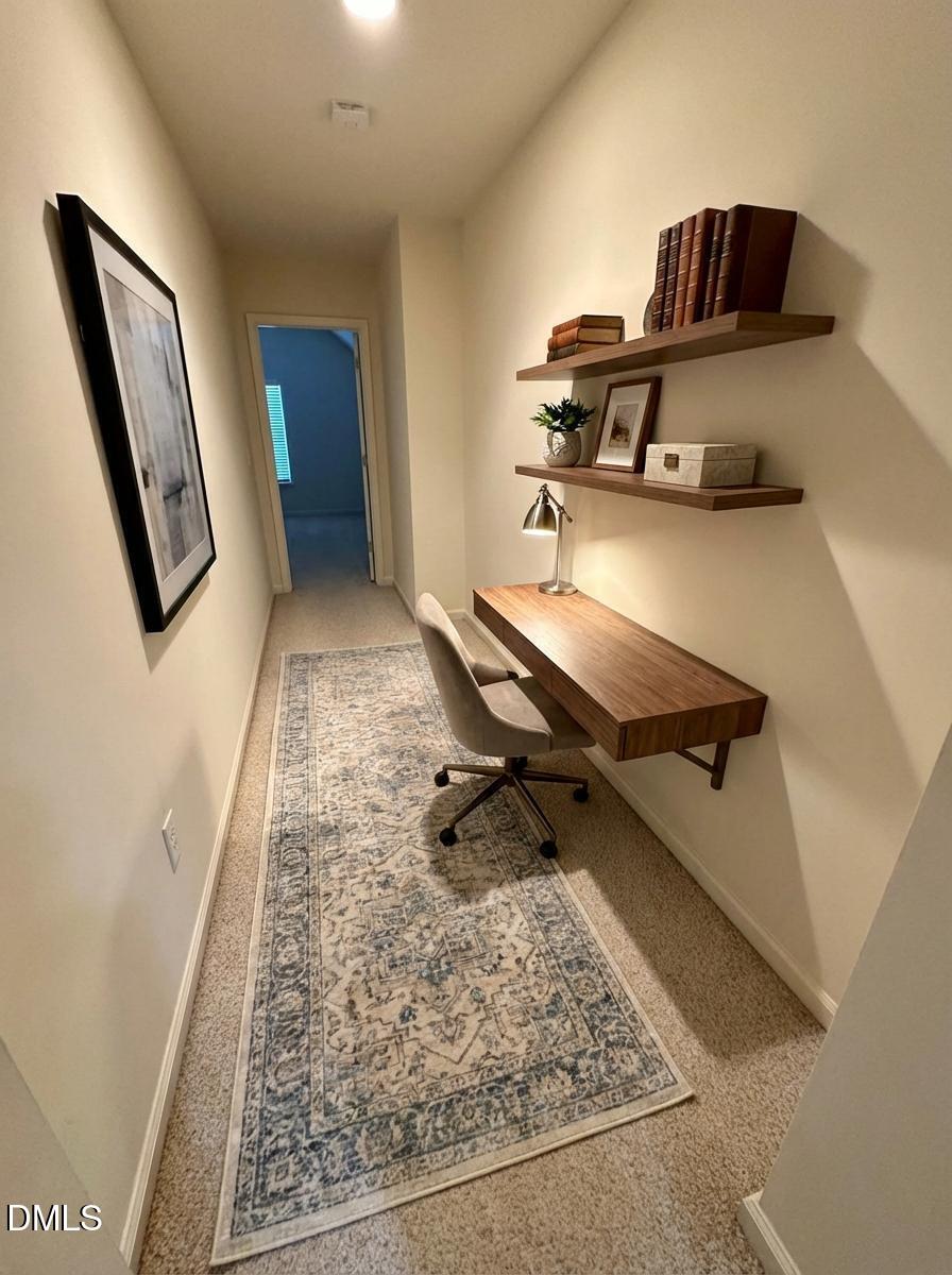 125 River Pearl Street Raleigh, NC 27603 - Photo 18 of 34 a room with gym equipment and a rug