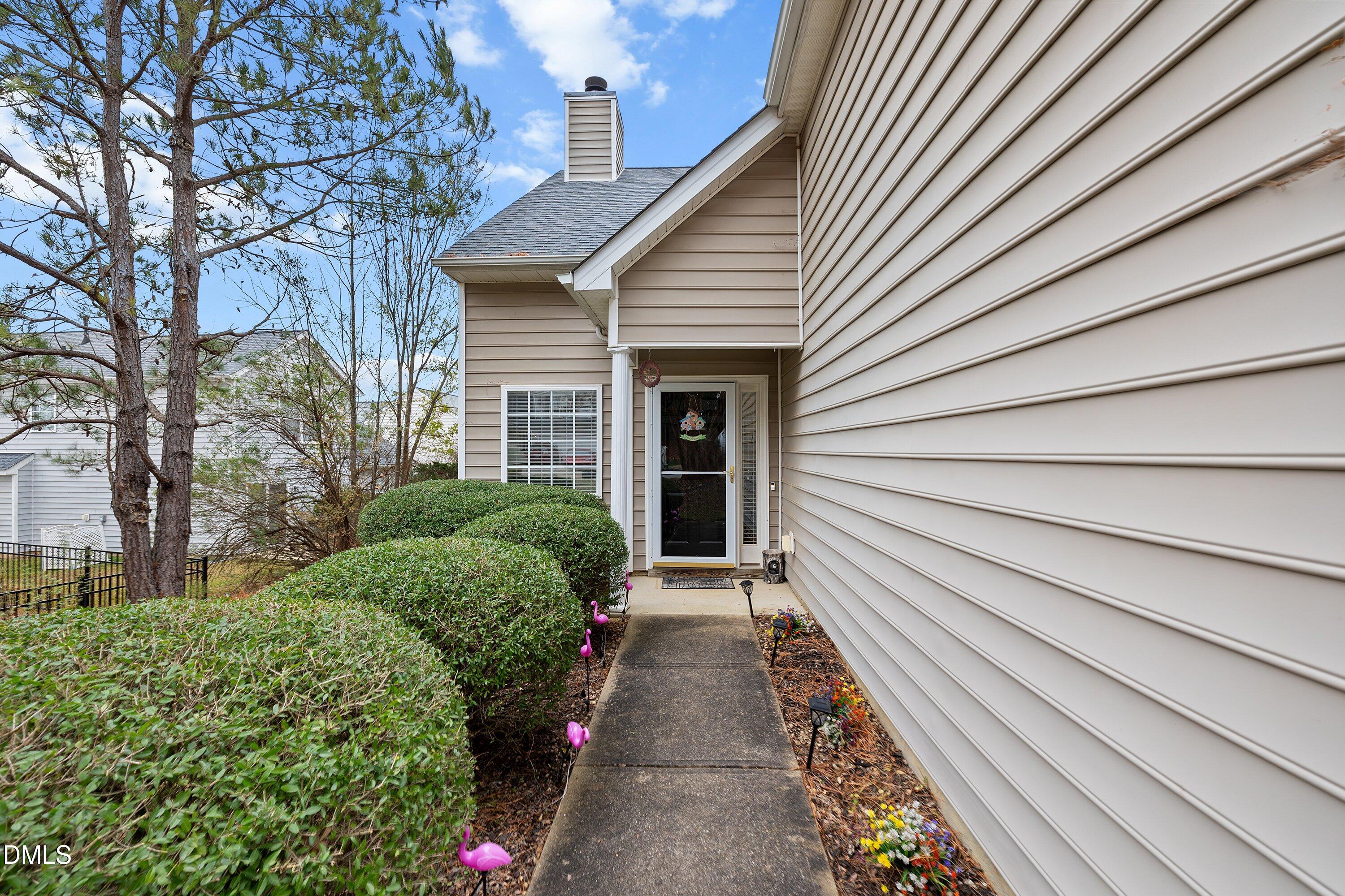 125 River Pearl Street Raleigh, NC 27603 - Photo 2 of 34 a house with trees in front of it