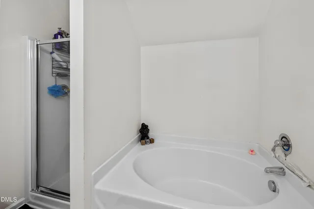 a bathroom with a bathtub