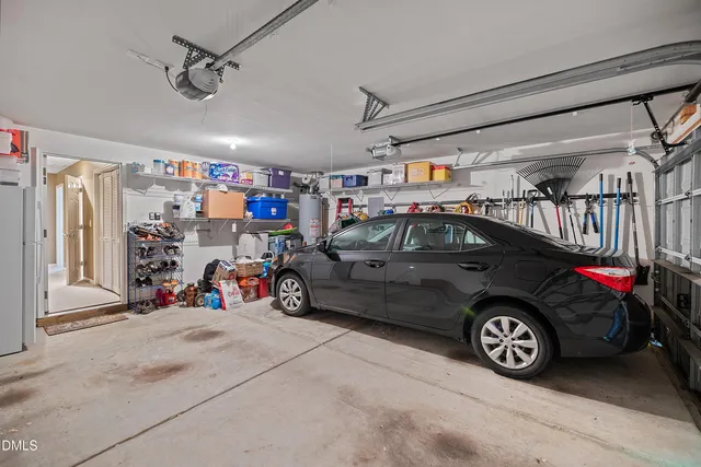a view of parking garage with cars