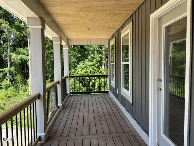119 Big Pine Road Clayton, NC 27520 - Photo 11 of 21 a view of balcony with wooden floor