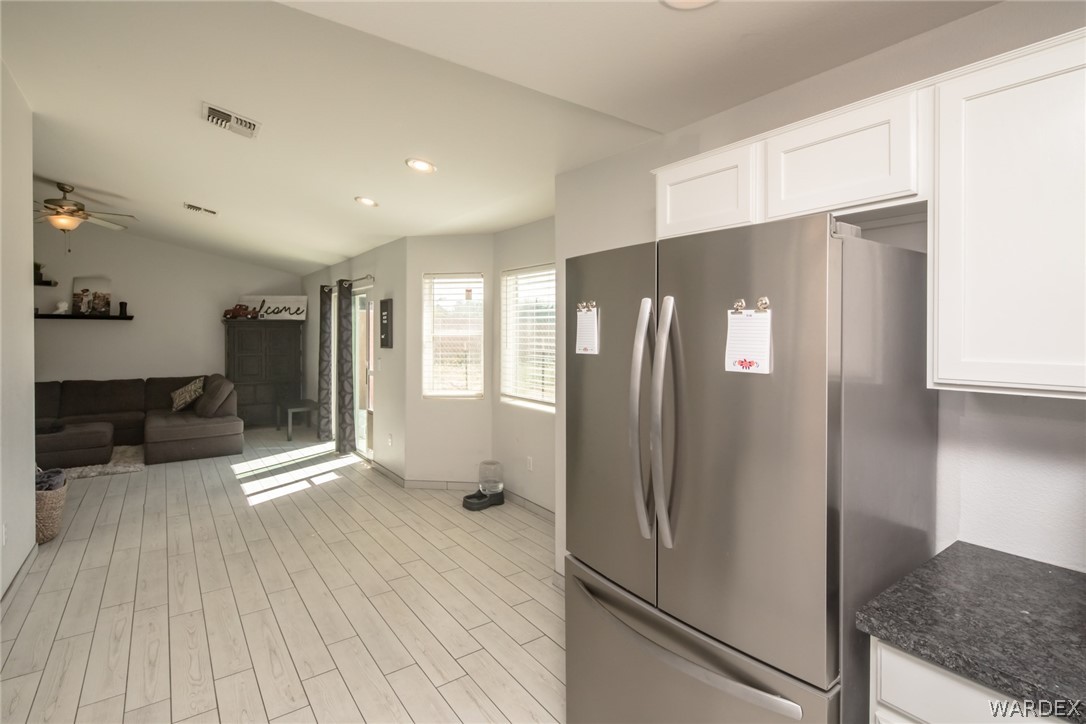 2080 Jamie Road Fort Mohave, AZ 86426 - Photo 16 of 29 a kitchen with stainless steel appliances granite countertop a refrigerator and a sink