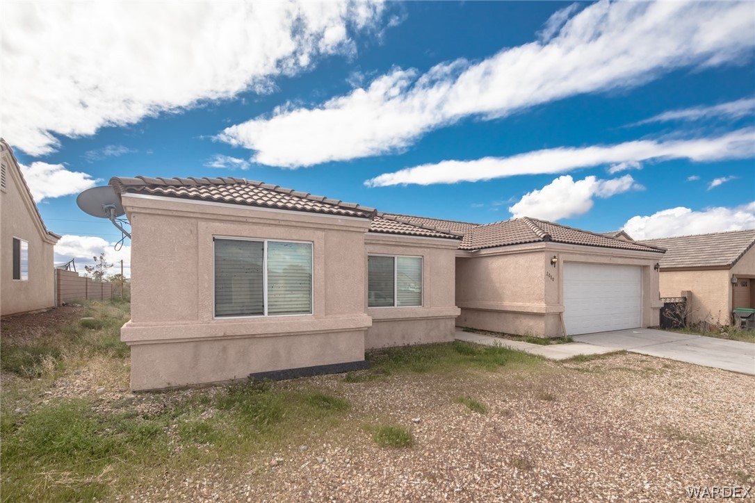 2080 Jamie Road Fort Mohave, AZ 86426 - Photo 2 of 29 a view of a house with a yard