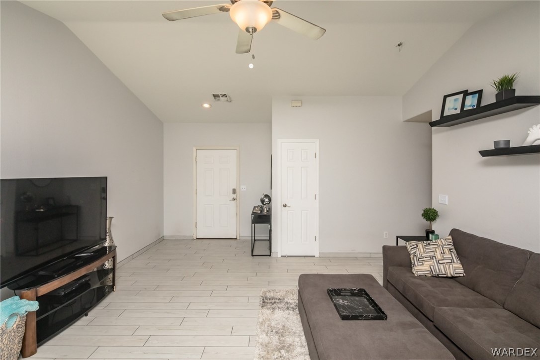 2080 Jamie Road Fort Mohave, AZ 86426 - Photo 7 of 29 a living room with furniture and a flat screen tv