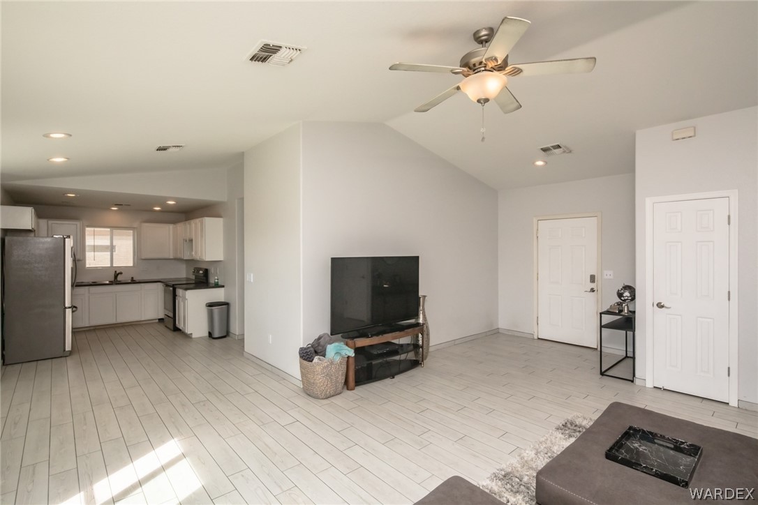 2080 Jamie Road Fort Mohave, AZ 86426 - Photo 8 of 29 a living room with furniture and a flat screen tv