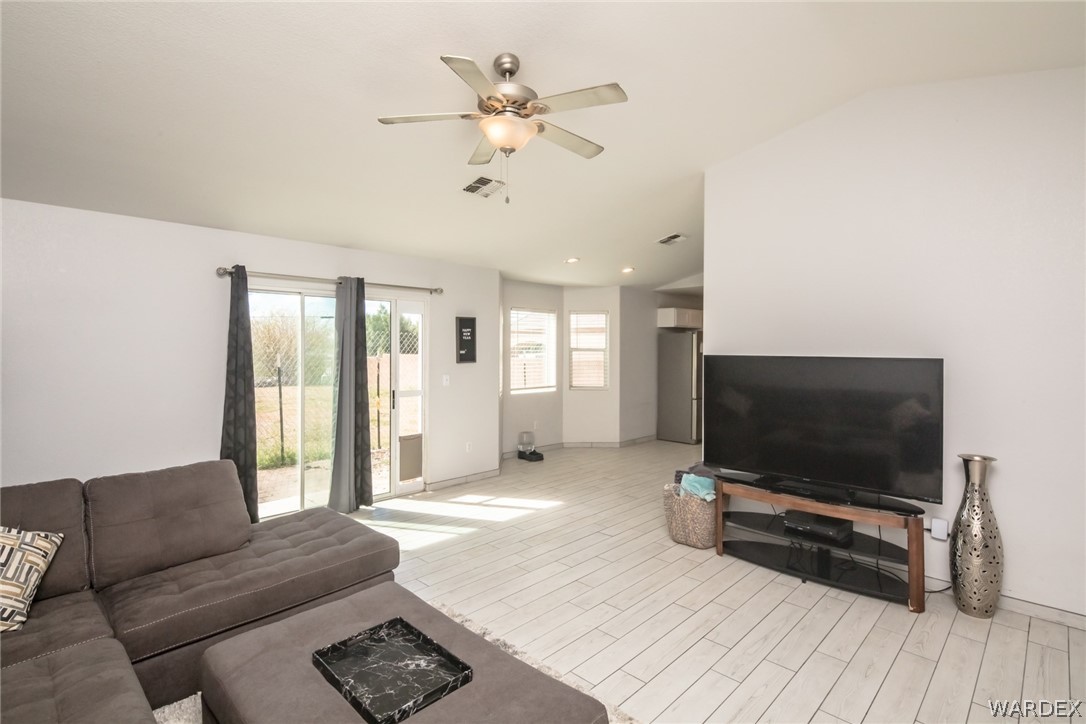2080 Jamie Road Fort Mohave, AZ 86426 - Photo 9 of 29 a living room with furniture and a flat screen tv