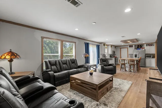 a view of a swimming pool with a yard