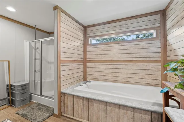 a bathroom with a sink and a large mirror