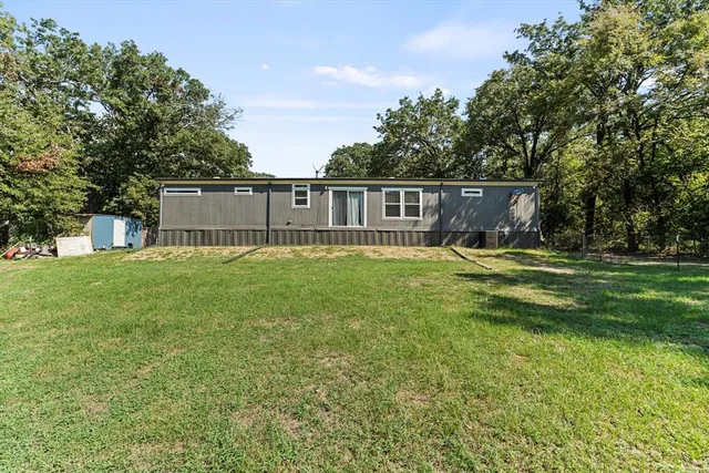 a view of a house with a park