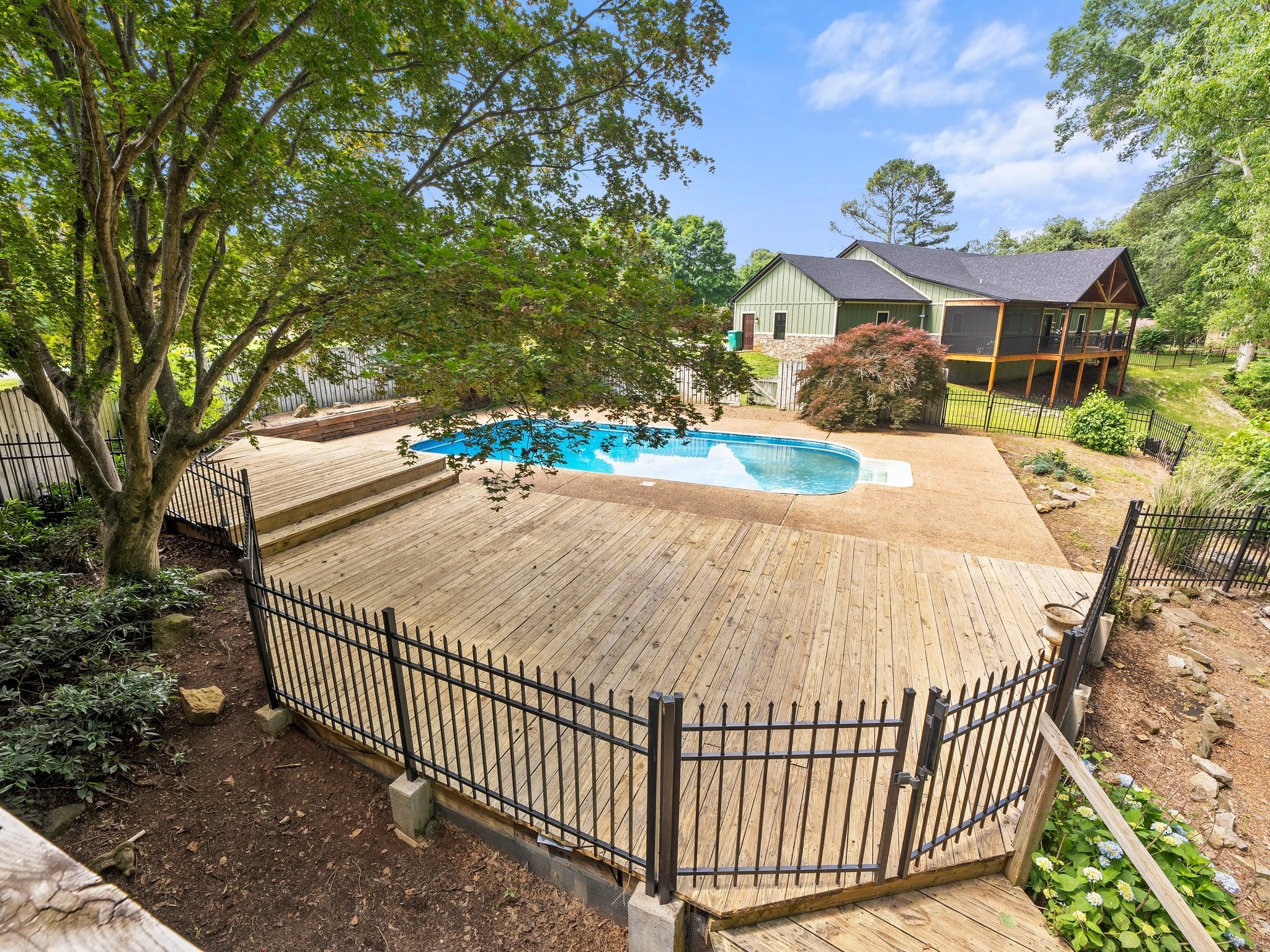 144 Wood Bluff Road Winchester, TN 37398 - Photo 1 of 63 a view of a wrought iron fences in front of house