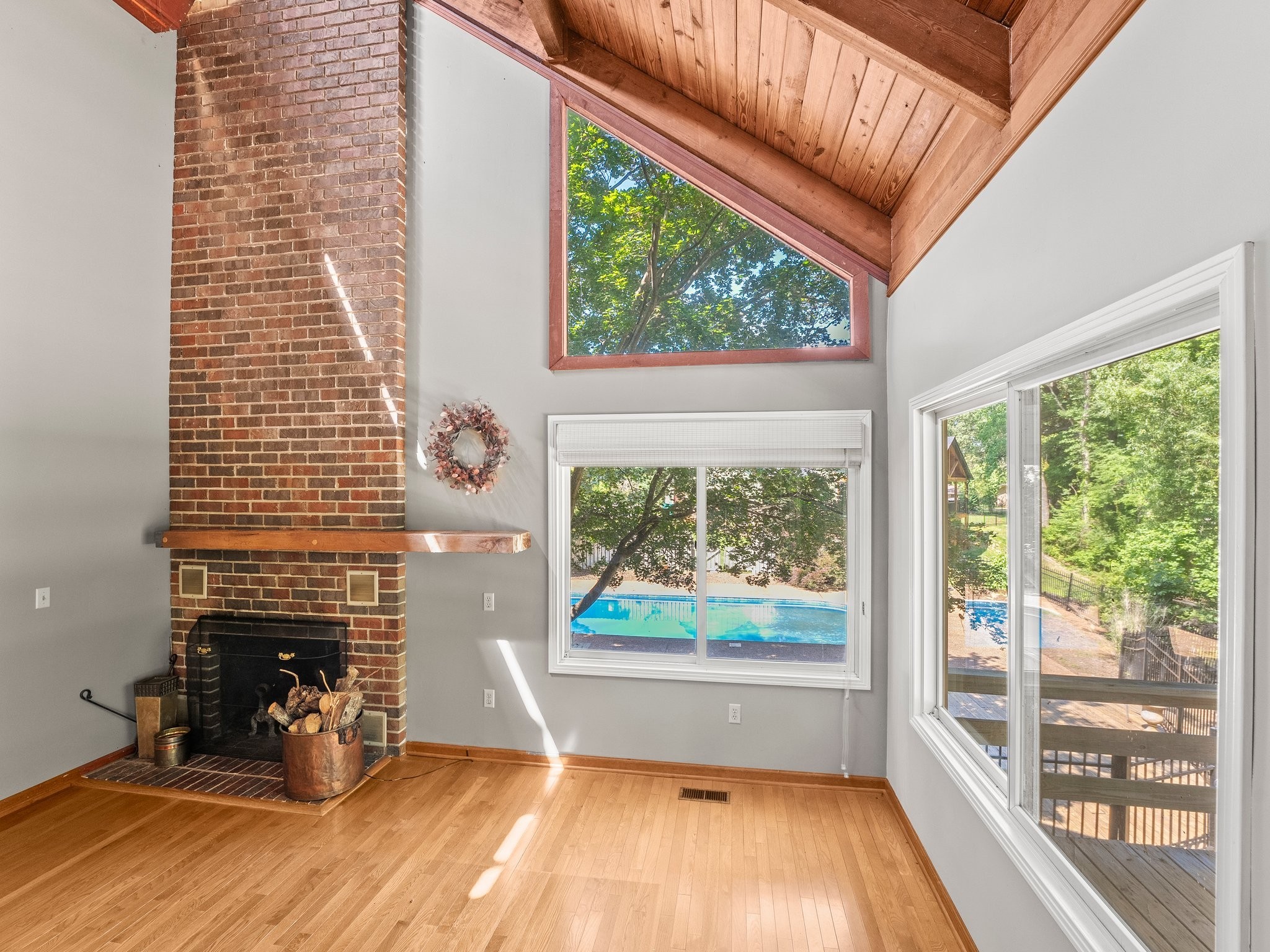 144 Wood Bluff Road Winchester, TN 37398 - Photo 12 of 63 a view of a room with wooden floor and a fireplace