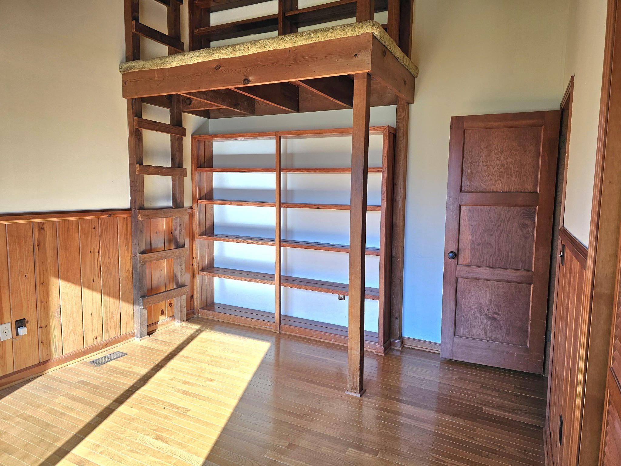 144 Wood Bluff Road Winchester, TN 37398 - Photo 25 of 63 a view of an empty room with wooden floor and a window
