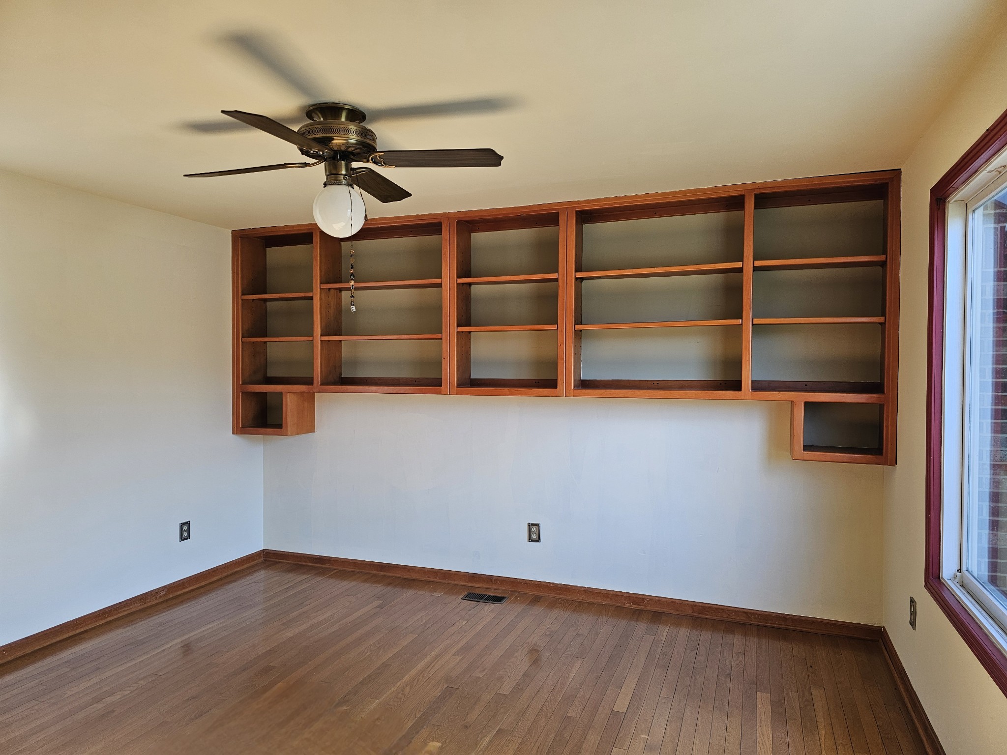 144 Wood Bluff Road Winchester, TN 37398 - Photo 27 of 63 a view of a room with wooden floor and shelf