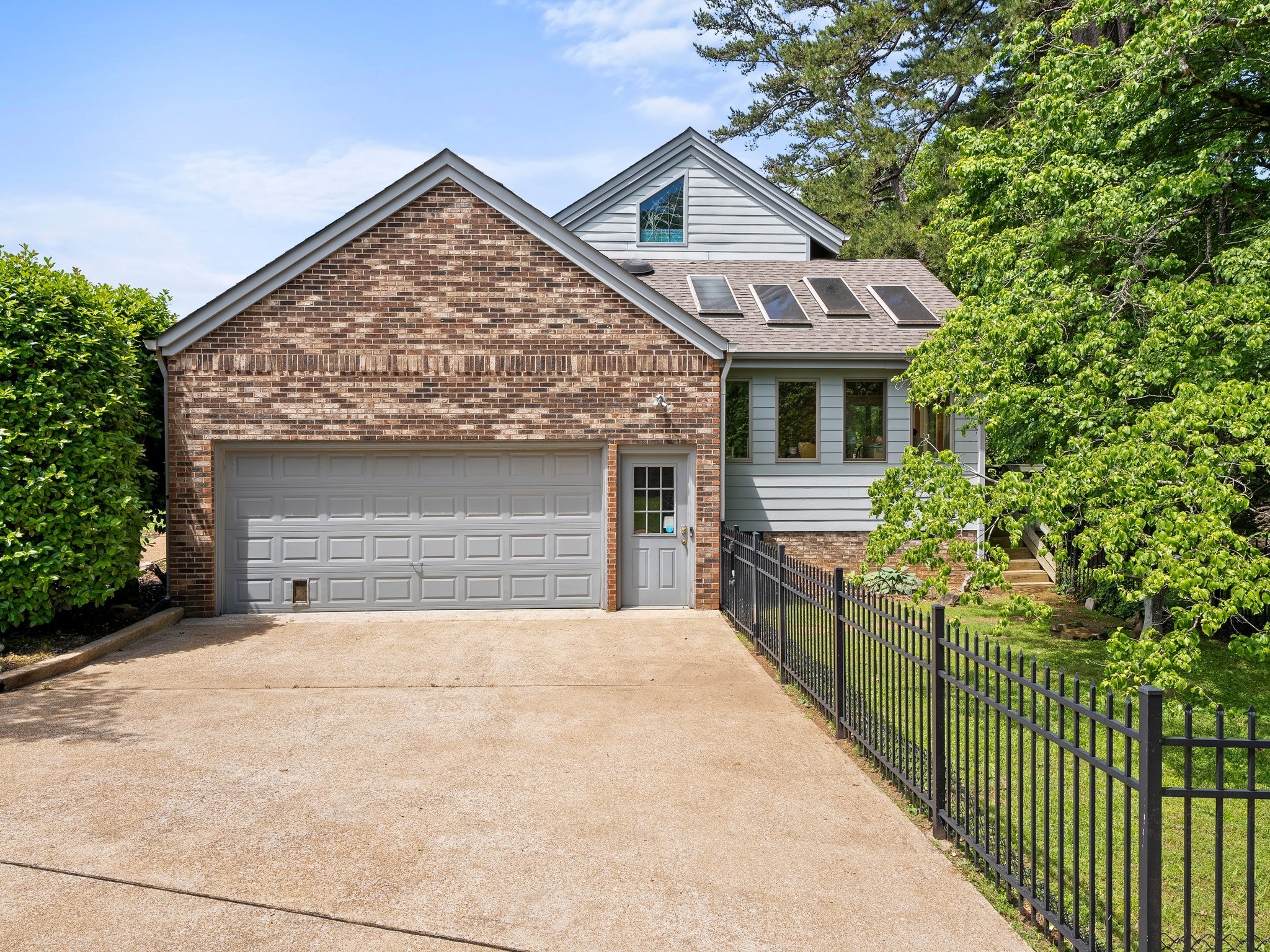 144 Wood Bluff Road Winchester, TN 37398 - Photo 53 of 63 a front view of house with yard and trees in the background