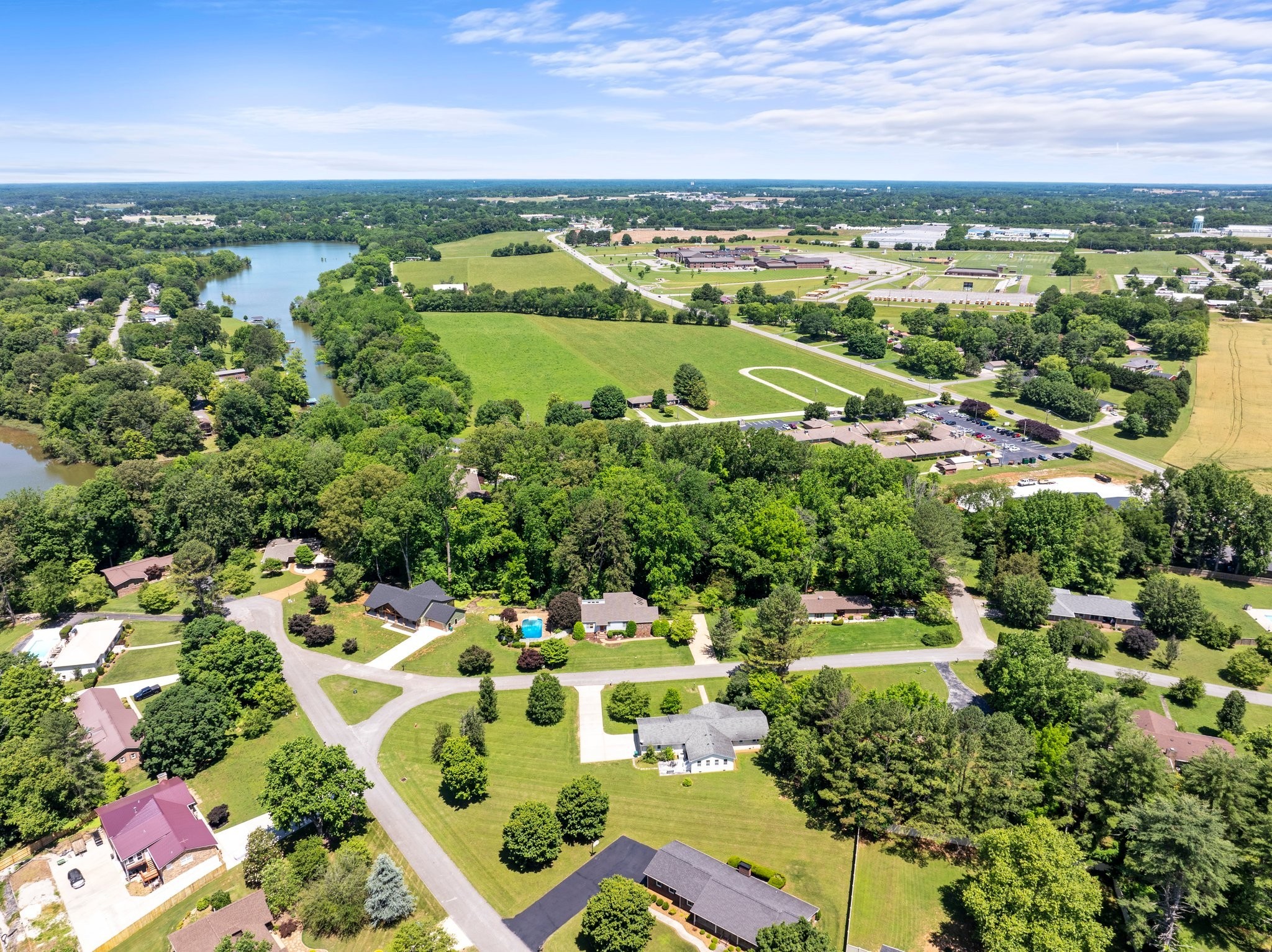 144 Wood Bluff Road Winchester, TN 37398 - Photo 55 of 63 an aerial view of a city with lots of residential buildings ocean and mountain view in back