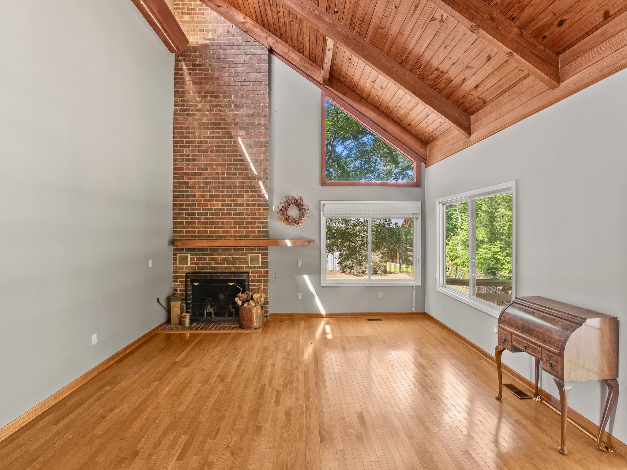 144 Wood Bluff Road Winchester, TN 37398 - Photo 10 of 63 a view of empty room with a window and wooden floor