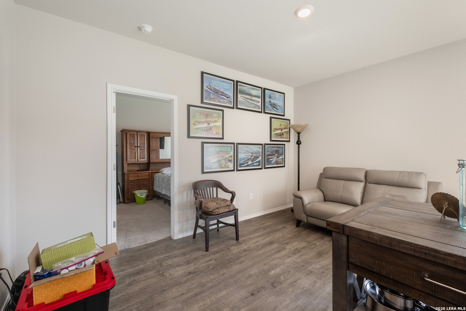 3505 Sky Place Seguin, TX 78155 - Photo 13 of 30 a living room with furniture and a wooden floor