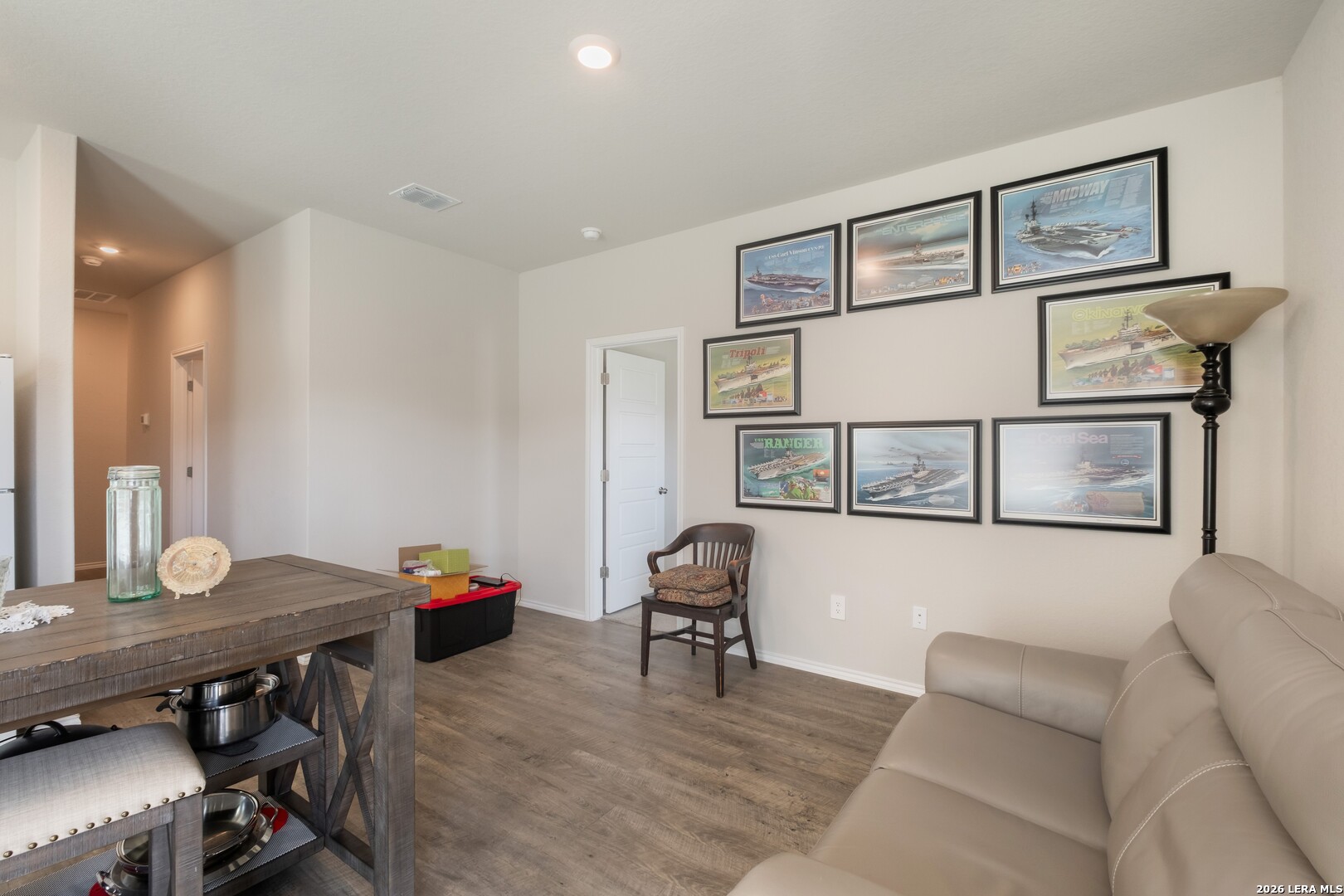 3505 Sky Place Seguin, TX 78155 - Photo 14 of 30 a living room with furniture and wooden floor