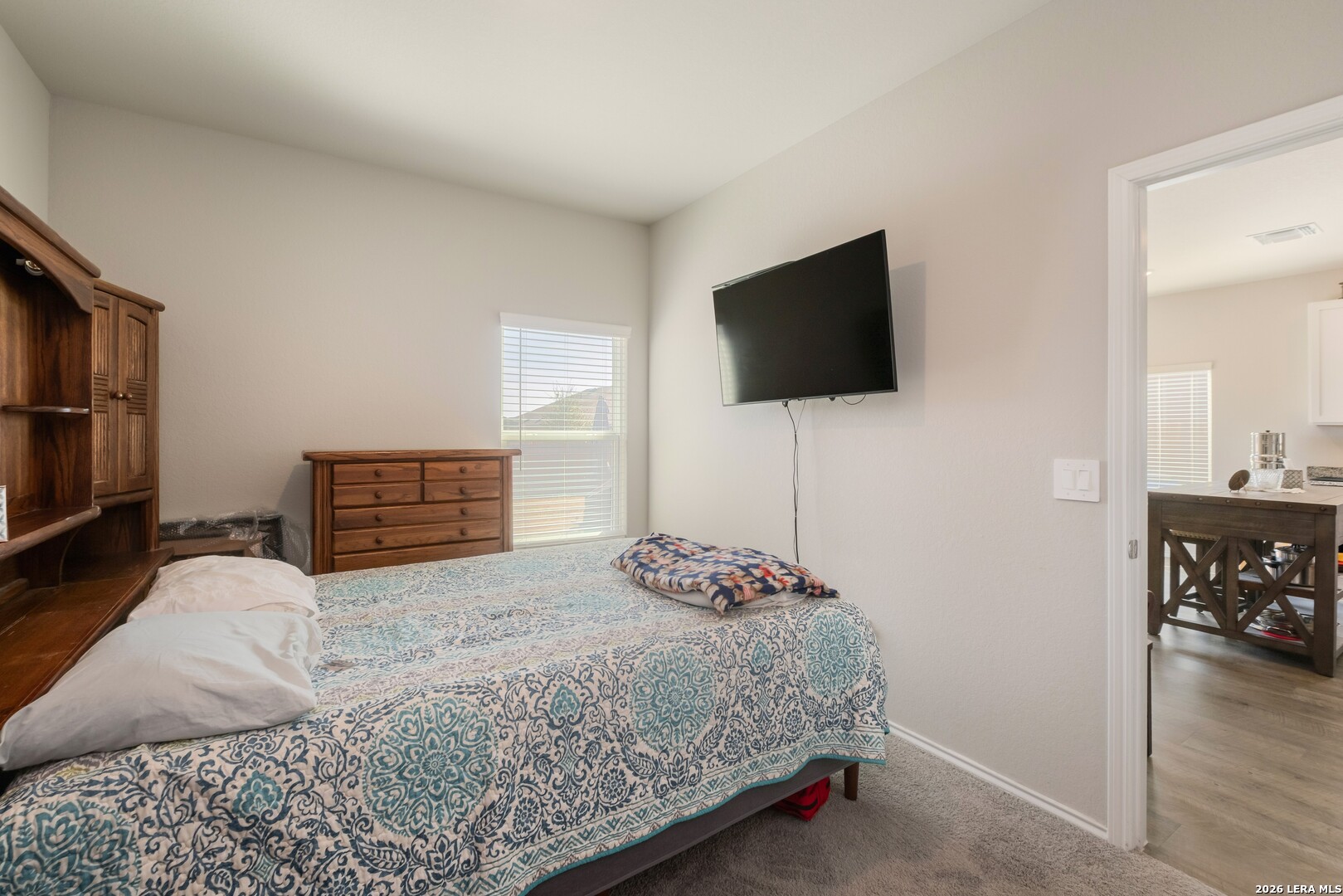 3505 Sky Place Seguin, TX 78155 - Photo 21 of 30 a bedroom with a bed and a flat screen tv